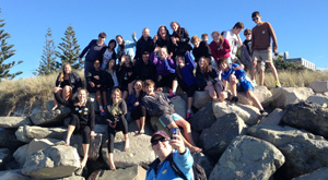 Coast Care's dune rehabilitation project by planting or weeding.