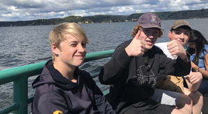 New Zealand students enjoying Waimangu boat cruise during school field trip with Learning Journeys.