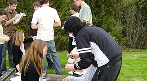 Water sample testing during paper mill school trip. 