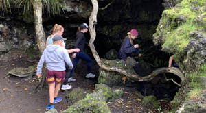 Rangitoto Island field trip. Students exploring lava caves during field trip with Learning Journeys. 