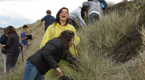 Coastal processes, sand dune restoration project during field trip with Learning Journeys.