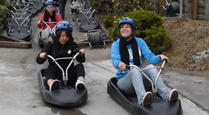 Students luging during North Island field trip.